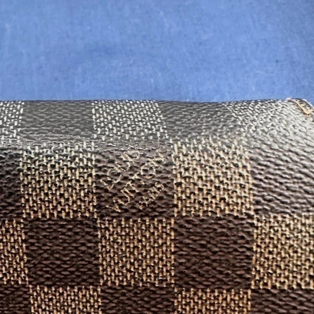 AUTHENTIC Louis Vuitton wallet. Damier Graphite Canvas.